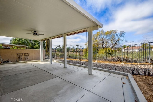 view of patio featuring ceiling fan