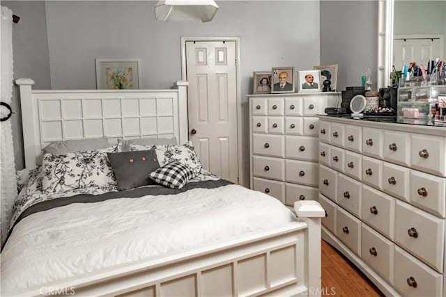 bedroom featuring hardwood / wood-style flooring