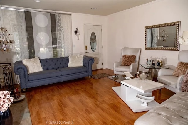 living room featuring crown molding and hardwood / wood-style floors