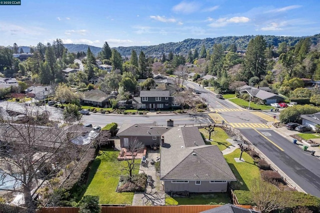 birds eye view of property with a mountain view