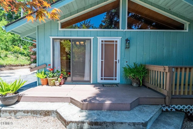 entrance to property with a wooden deck