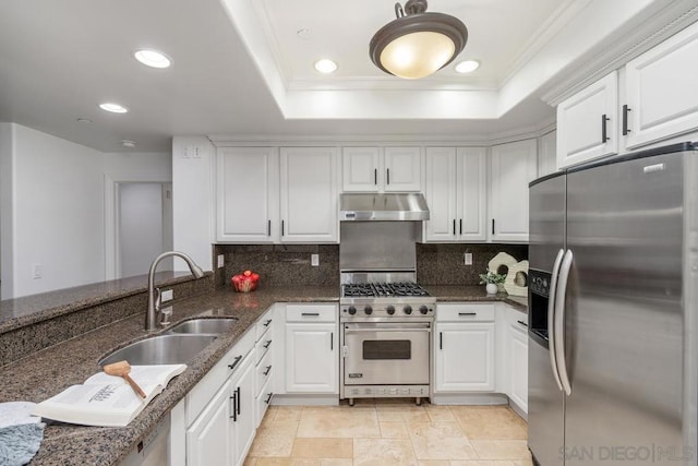 kitchen featuring white cabinetry, appliances with stainless steel finishes, and sink