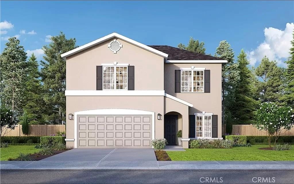 front of property featuring a garage and a front yard