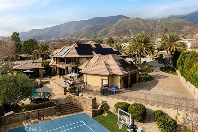 drone / aerial view featuring a mountain view