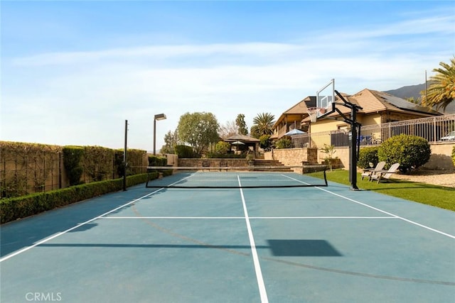 view of sport court with a gazebo