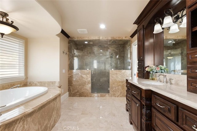 bathroom with plus walk in shower and vanity