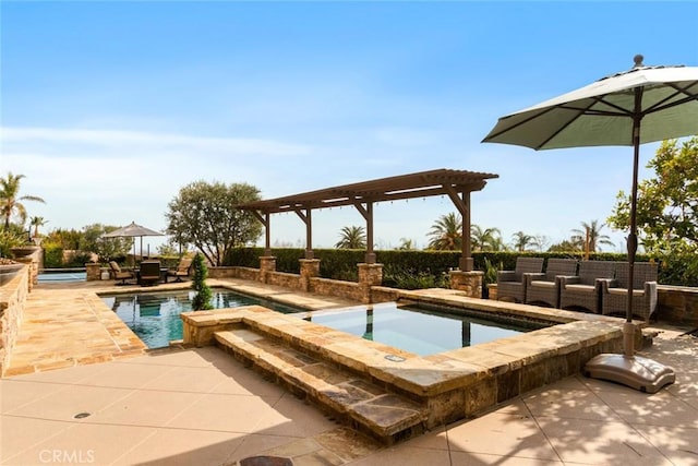 view of swimming pool featuring an in ground hot tub, a pergola, and a patio area