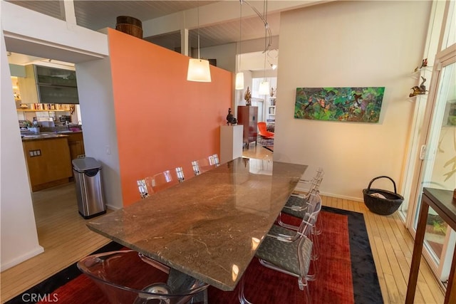 dining room featuring hardwood / wood-style flooring