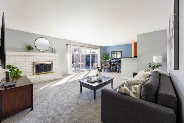 living room with a fireplace and light colored carpet