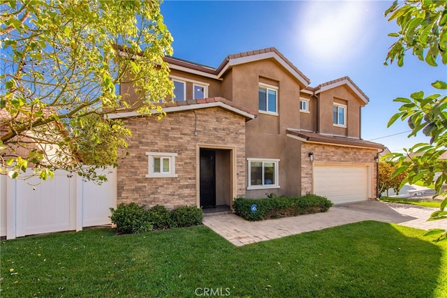 view of front of property featuring a garage and a front yard