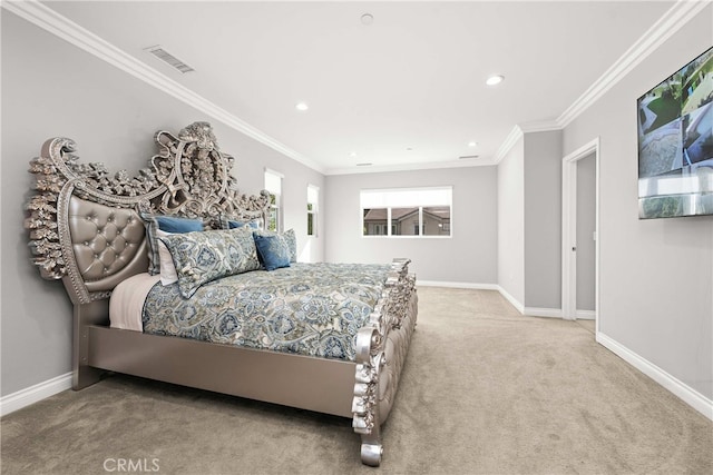 bedroom with crown molding and light colored carpet