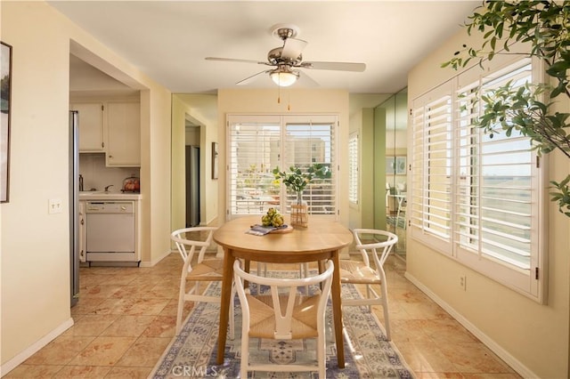 dining room with ceiling fan