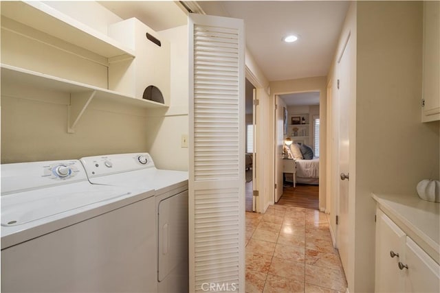 laundry room featuring separate washer and dryer