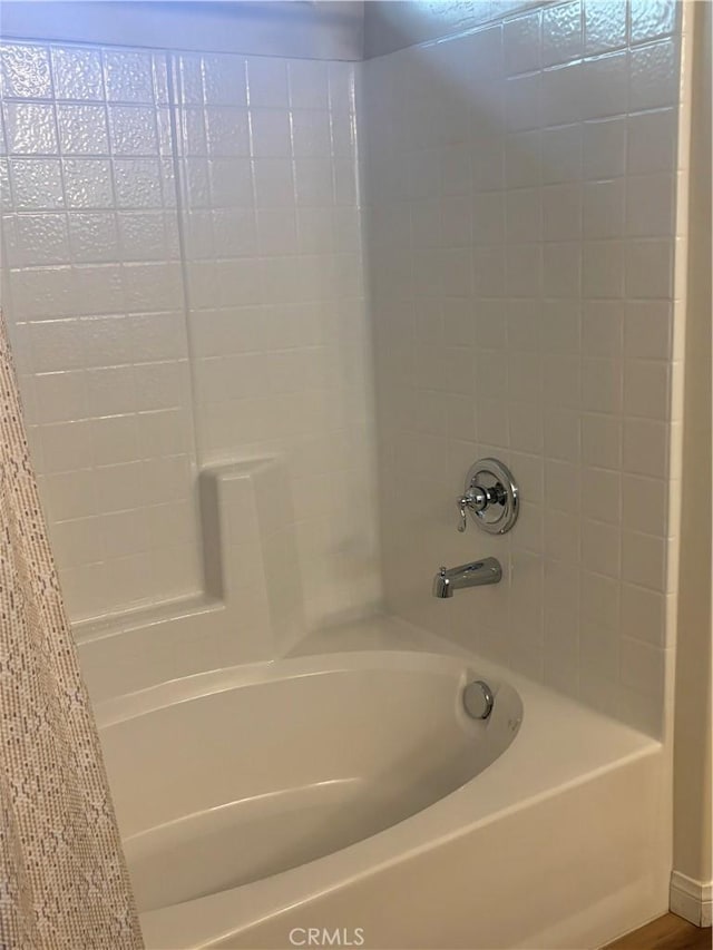 bathroom featuring shower / bath combination