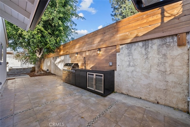 view of patio / terrace with exterior kitchen and area for grilling