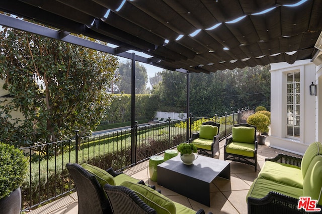 view of patio featuring a pergola and outdoor lounge area