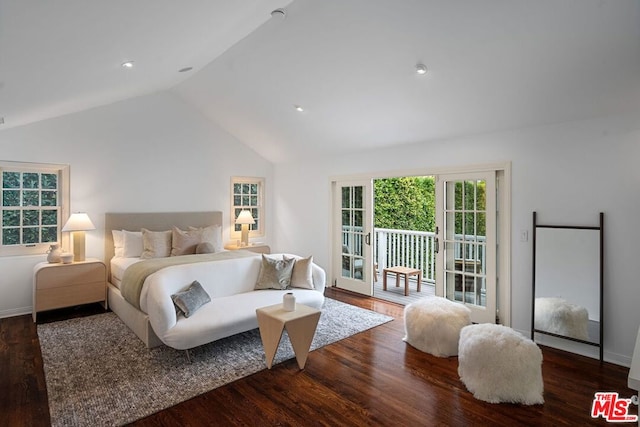 bedroom featuring vaulted ceiling, dark wood-type flooring, and access to outside