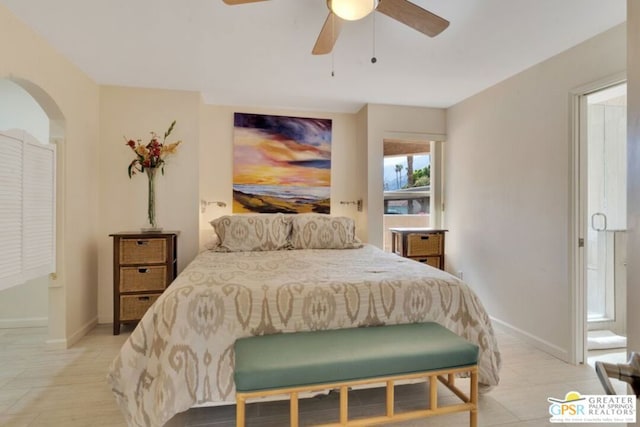 tiled bedroom featuring ceiling fan