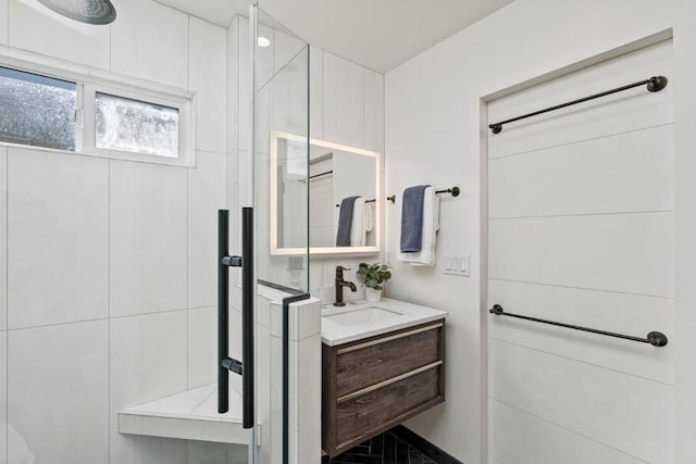 bathroom with vanity and an enclosed shower