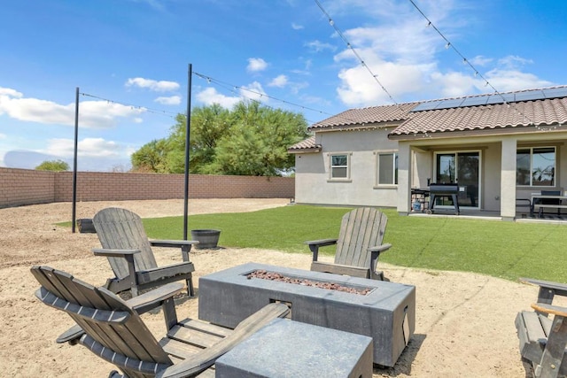 view of patio / terrace featuring a fire pit