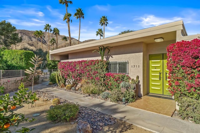 doorway to property with a mountain view