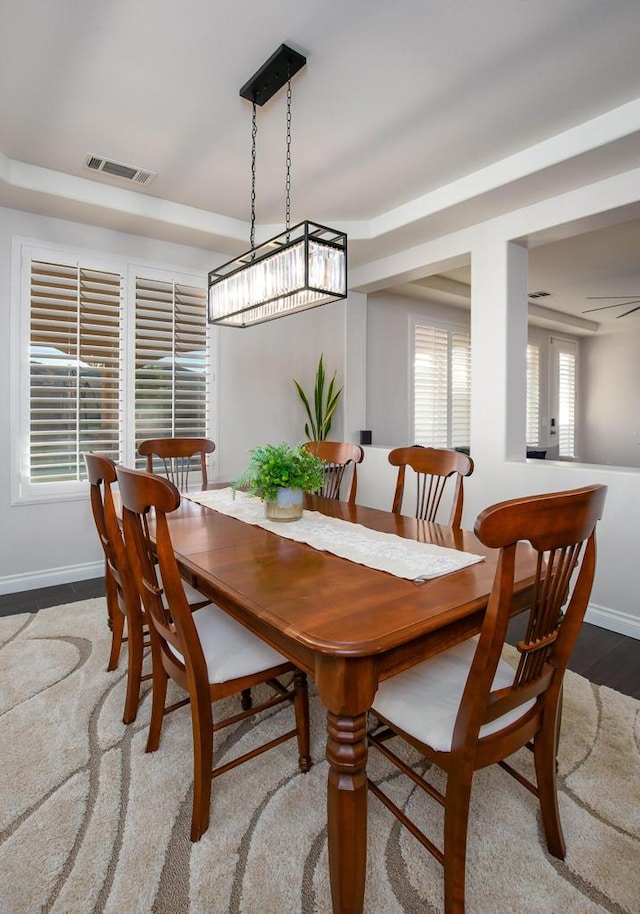 dining room featuring wood-type flooring