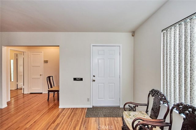 entryway with light hardwood / wood-style flooring