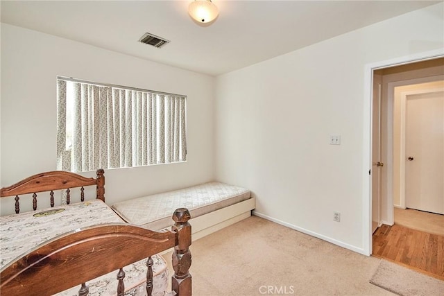 bedroom featuring carpet