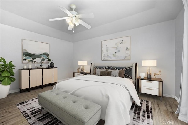 bedroom featuring wood-type flooring and ceiling fan