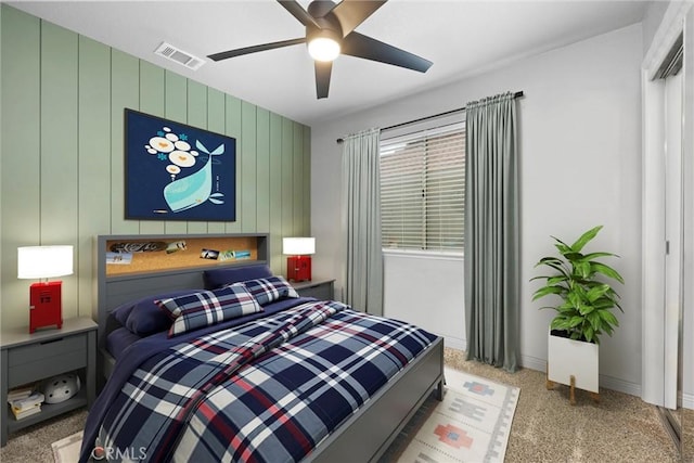 carpeted bedroom with ceiling fan