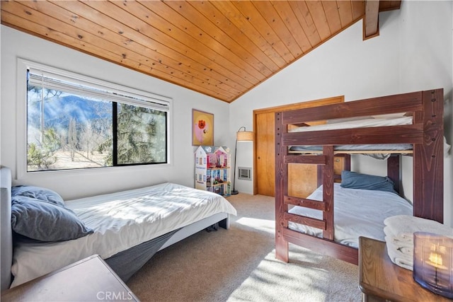 carpeted bedroom with vaulted ceiling and wooden ceiling