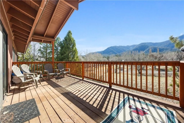 wooden terrace with a mountain view