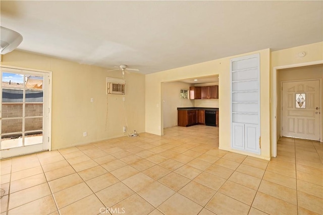 unfurnished living room featuring ceiling fan, a wall mounted AC, and light tile patterned floors