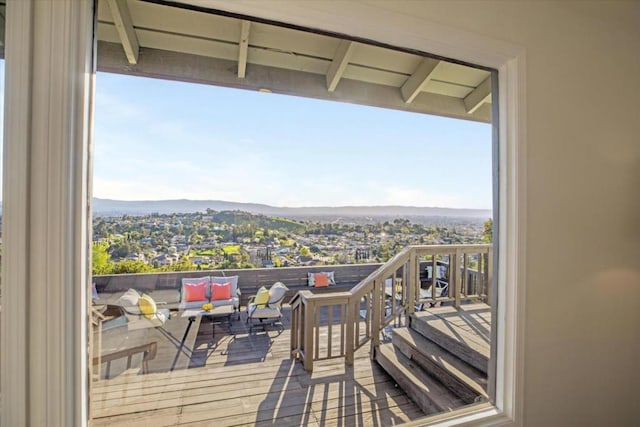 balcony featuring outdoor lounge area and a mountain view