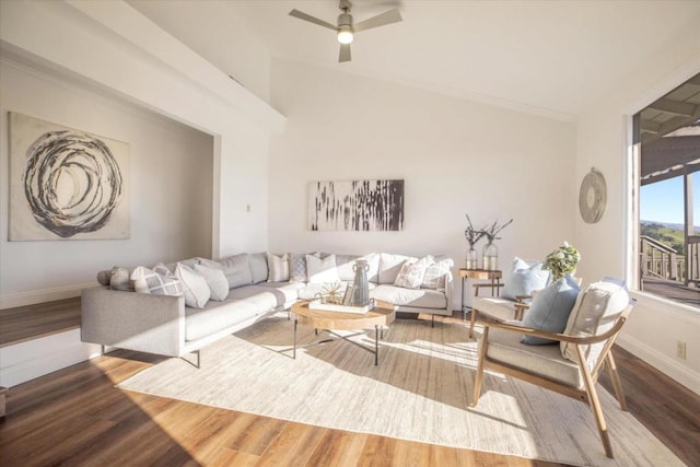 living room featuring ceiling fan and hardwood / wood-style floors