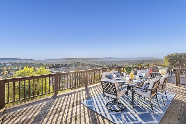 wooden deck with a water view