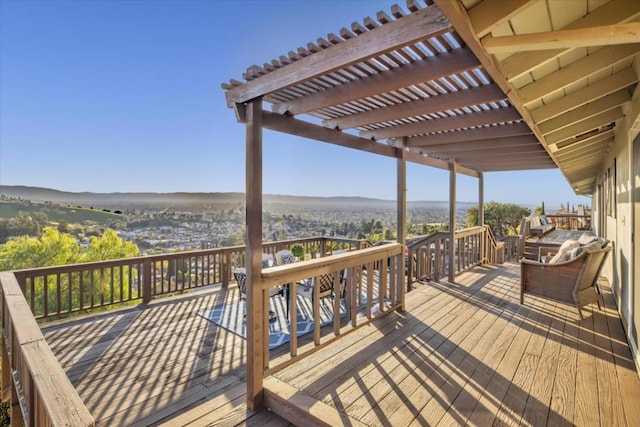 wooden deck with a pergola