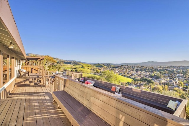 wooden terrace with a mountain view