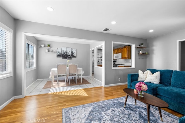 living room featuring light wood-type flooring