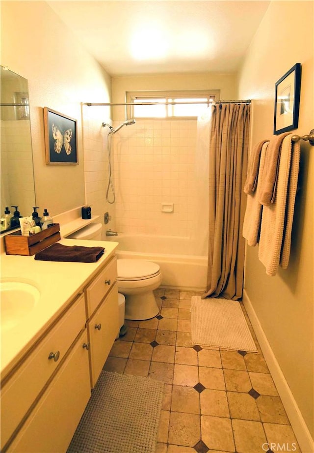 full bathroom featuring tile patterned floors, vanity, toilet, and shower / bath combo