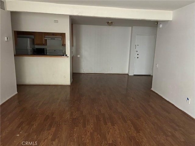 unfurnished living room featuring dark hardwood / wood-style flooring