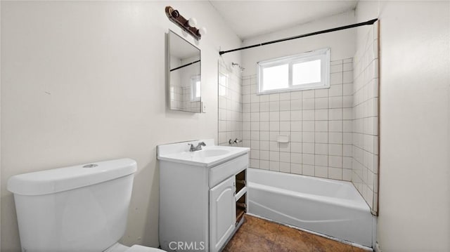 full bathroom with vanity, toilet, and tiled shower / bath combo