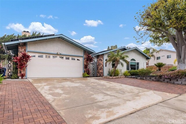 single story home featuring a garage