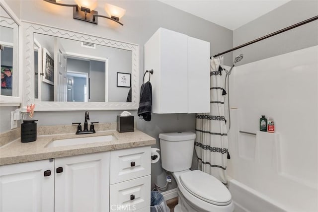 full bathroom with vanity, toilet, and shower / tub combo with curtain