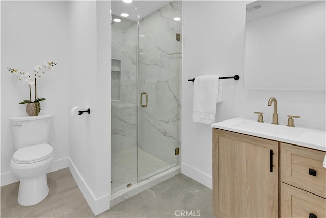 2741 Houston Dr, Los Osos, CA 93402 - full bath with a marble finish shower, toilet, vanity, and baseboards