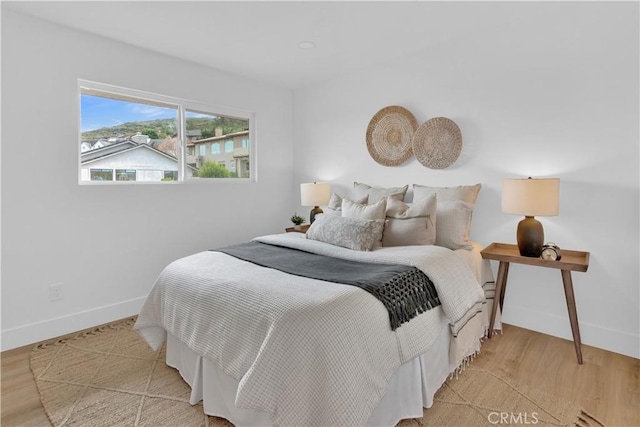 2741 Houston Dr, Los Osos, CA 93402 - bedroom with baseboards and light wood-type flooring