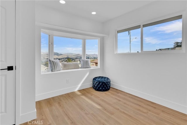 2741 Houston Dr, Los Osos, CA 93402 - spare room featuring recessed lighting, baseboards, and wood finished floors