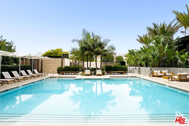 view of pool with outdoor lounge area