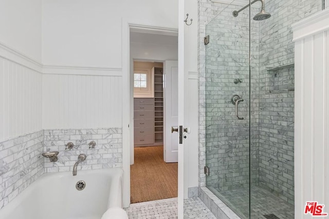 bathroom with independent shower and bath