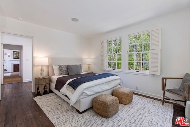 bedroom featuring dark hardwood / wood-style floors